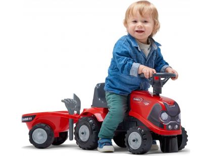 Falk Odstrkovadlo traktor Baby Case IH červený s vlečkou, lopatkou a hrabičkami